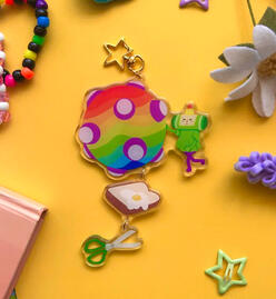 Connected acrylic charm with epoxy front and star clap