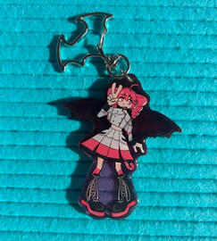 Acrylic charm with epoxy front and bat wing clasp