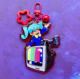 Acrylic charm with epoxy front and red decorative clasp